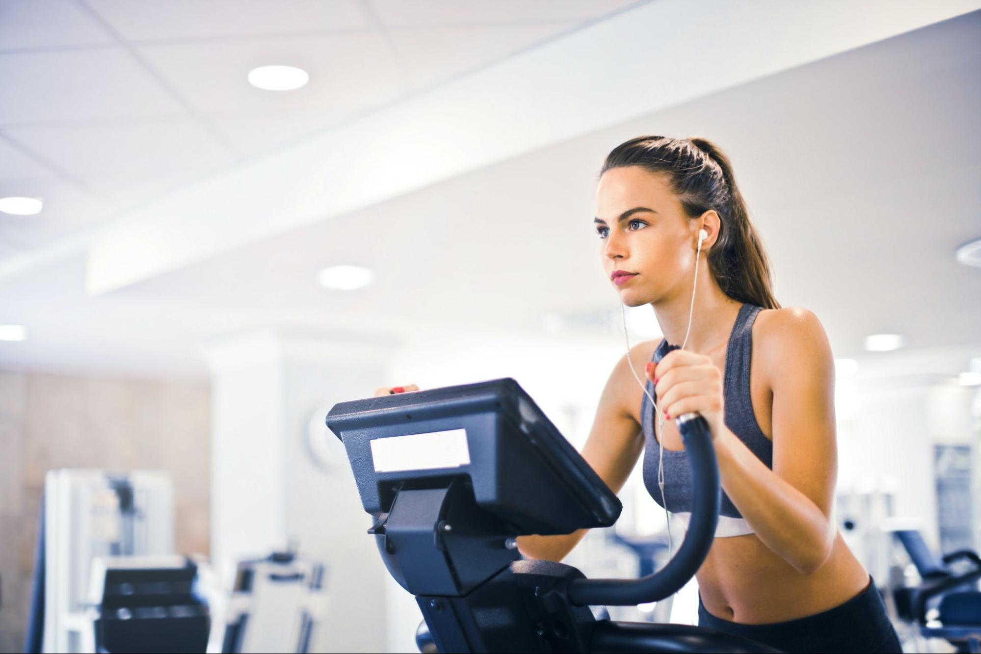 Woman on stair master before before weigh loss meditation practice